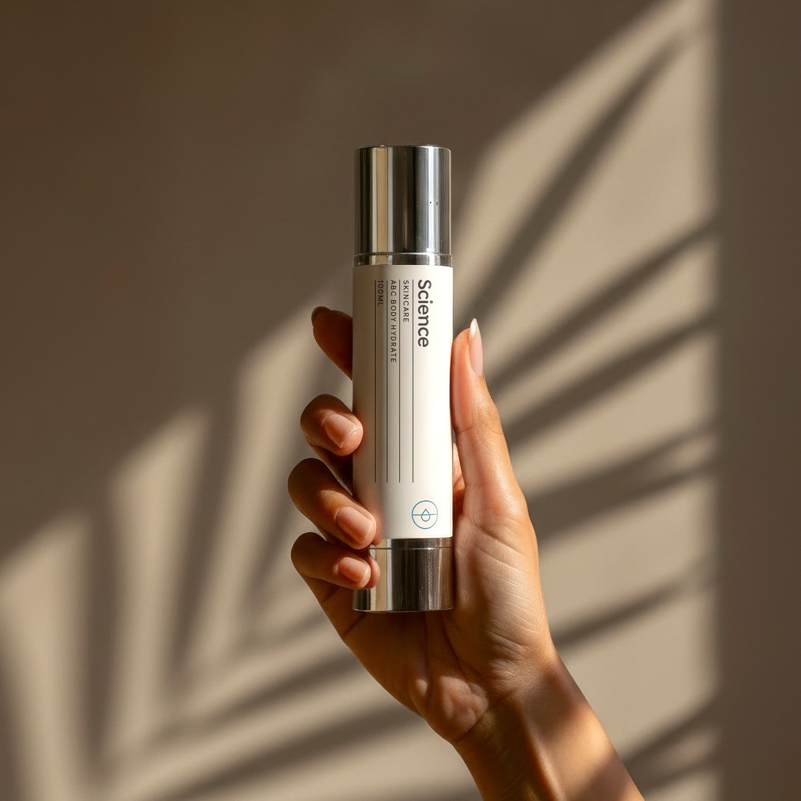 ABC Hand + Body Hydrate lifestyle image showing multivitamin restoration moisturiser with peptides, CoQ10 and Australian botanicals for healing, plumping and protecting hands and body
