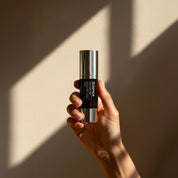 Exfoliant Fusion Serum AHA lifestyle image showing premium resurfacing serum with lactic acid, blueberry, minerals and hyaluronic acid for brightening, hydrating and revealing fresh glowing skin