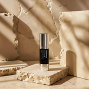 Exfoliant Fusion Serum AHA 30ml on stone background - gentle exfoliating serum with caviar lime, Manuka honey and fruit extracts for resurfacing and luminous hydrated skin