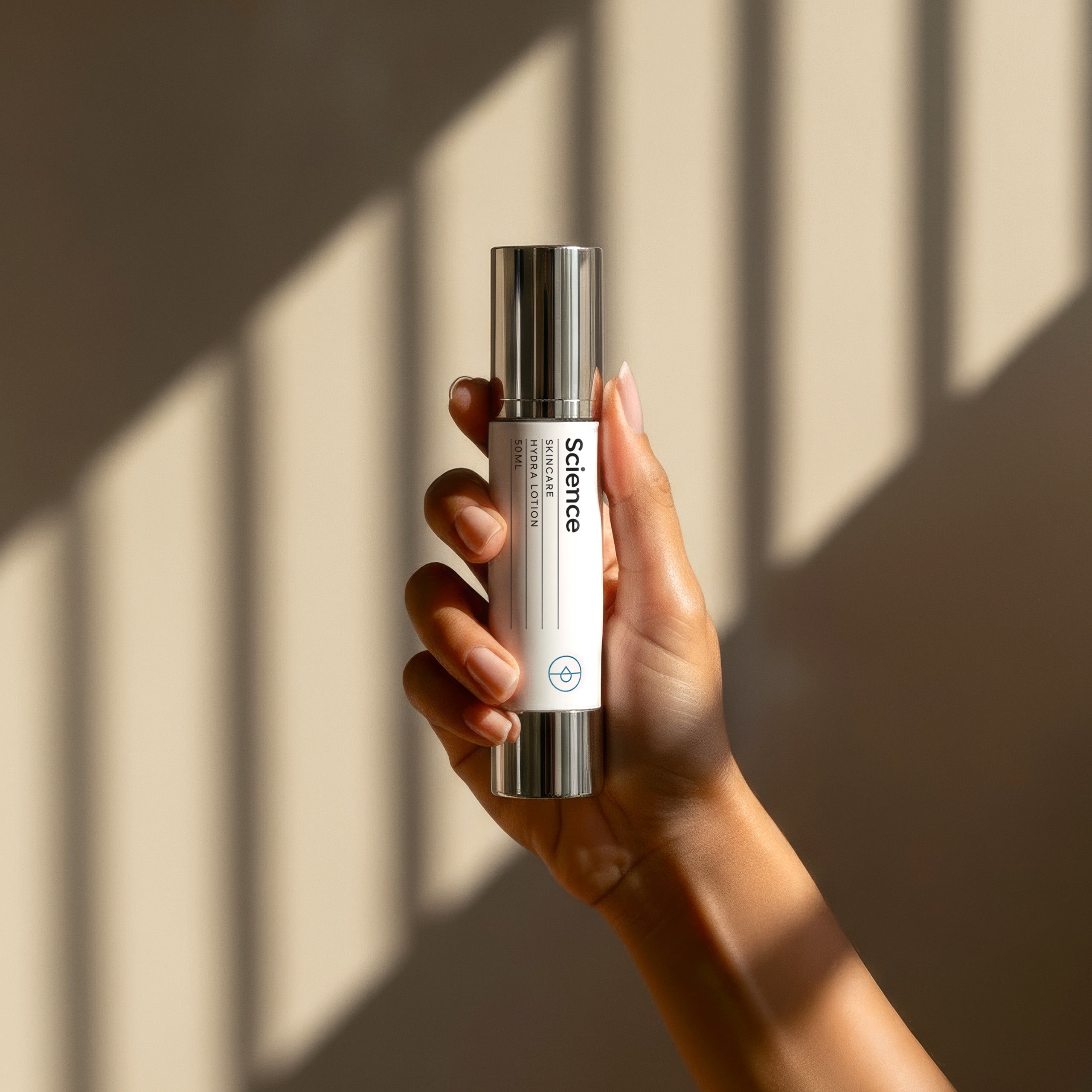 Hydra Lotion lifestyle image showing lightweight moisturising lotion with hyaluronic acid, green tea and aloe vera for barrier repair, calming sensitive and blemish-prone skin