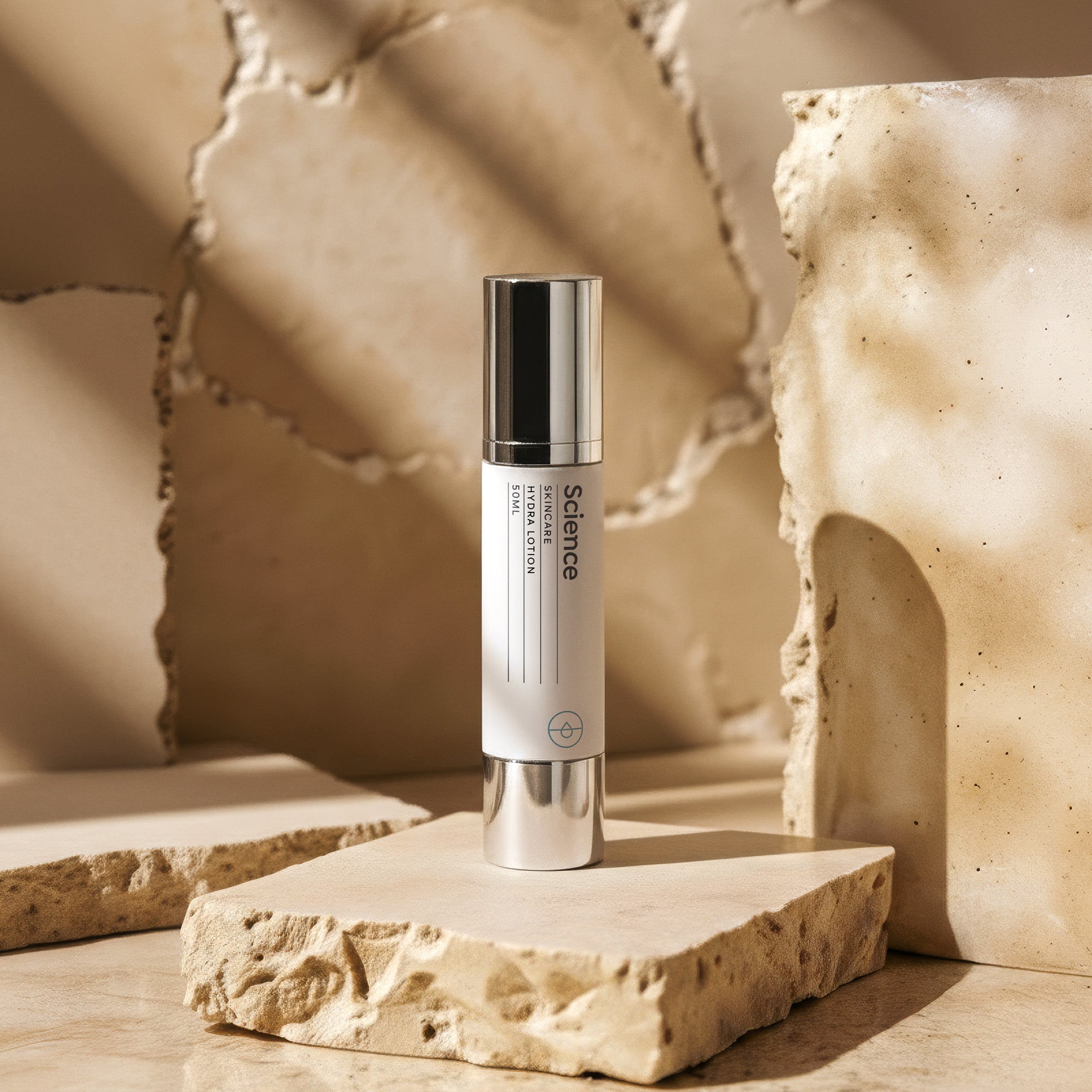 Hydra Lotion 50ml on stone background - award-winning non-comedogenic oil-free moisturiser with Manuka honey, peptides and minerals for acne-prone and oily skin
